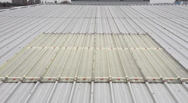 Industrial rooflight with poppy red fixings