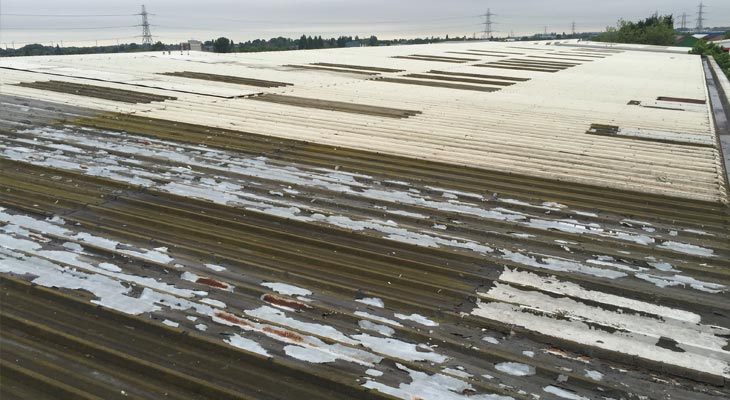 View of old industrial roof in need of repair