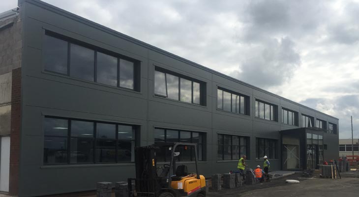 Kingspan wall cladding in anthracite grey to 40 by 6 metres front elevation