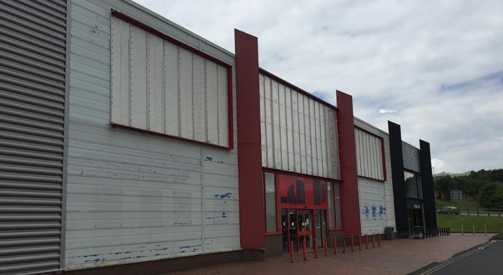 Retail park unit in Dudley with extensive solar degradation