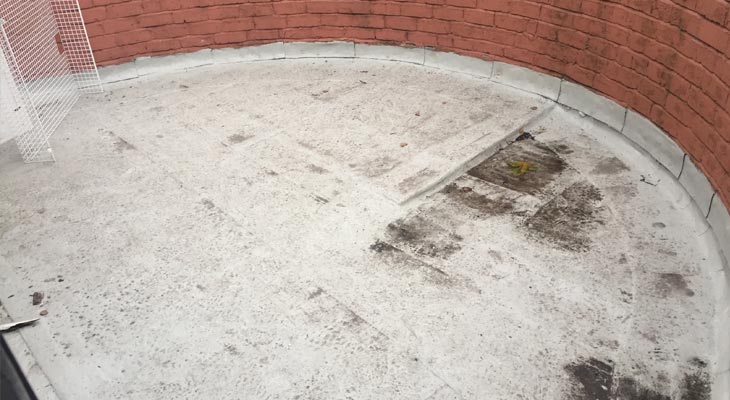 Circular flat roof after being cleaned