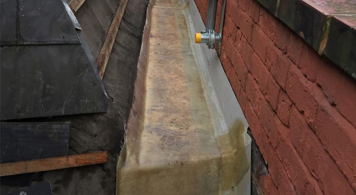 OSB boards and fleece installed to form gutter base and upstands