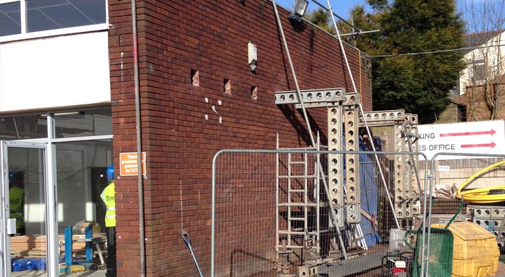 Showroom side elevation brick wall with structural steelwork underway