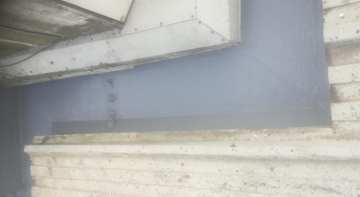 Giromax HPG topcoat applied around industrial gutter bends