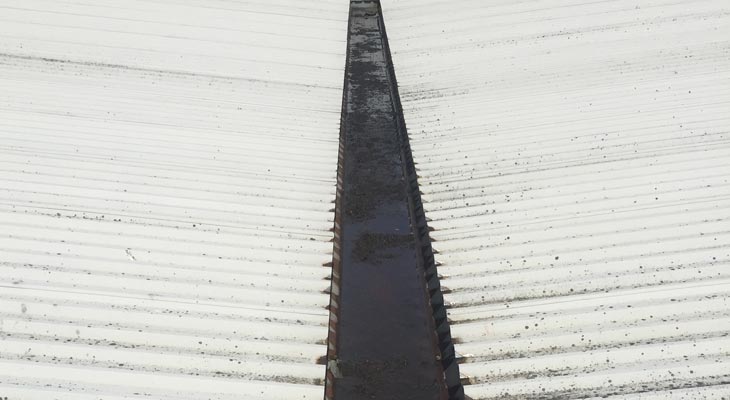 Valley gutter with cut edge corrosion to the eaves