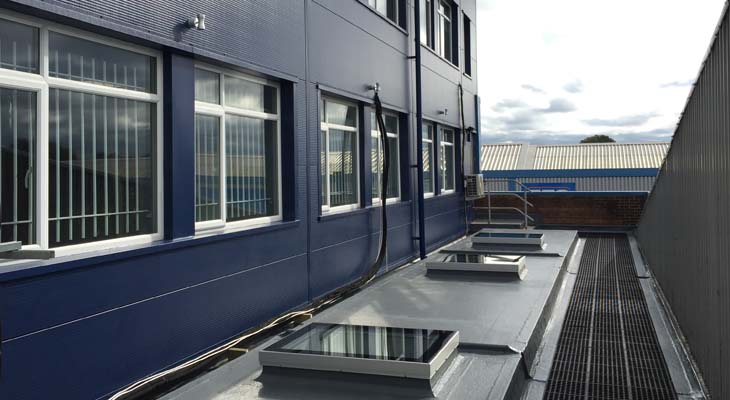 GRP flat roof with skylights installed