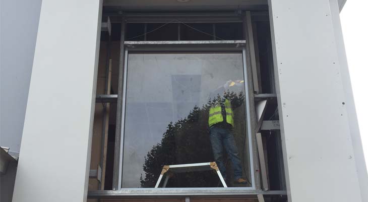 Cladding removed and glazing being installed