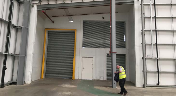 Operative walking out through the loading bay extension