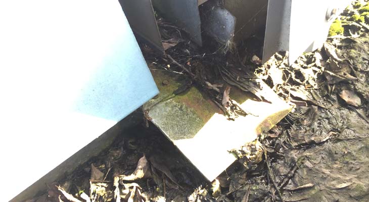 Gutter detail from projected roof section feeding into main gutter