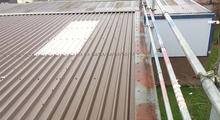 Existing barge flashings reused with newly installed roof sheets