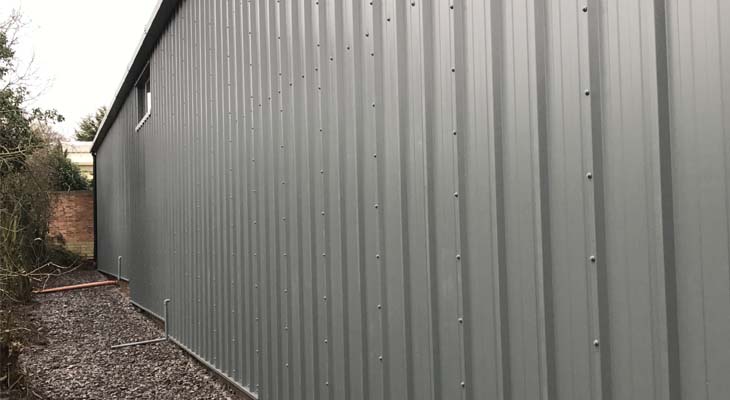 Kingspan RW1000 composite panels installed to rear elevation with step up detail