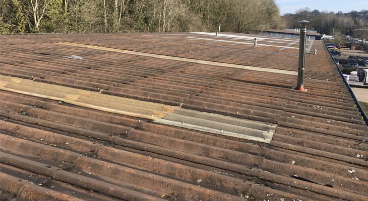 Old 1000 square metre mono-pitched asbestos roof