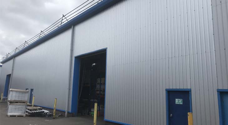 View along the rear elevation with new press brake cladding sheets installed