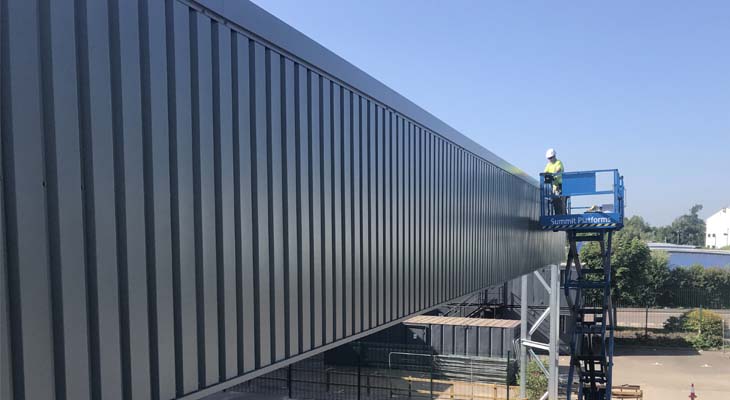 Works undertaken to canopy wall cladding from scissor lift